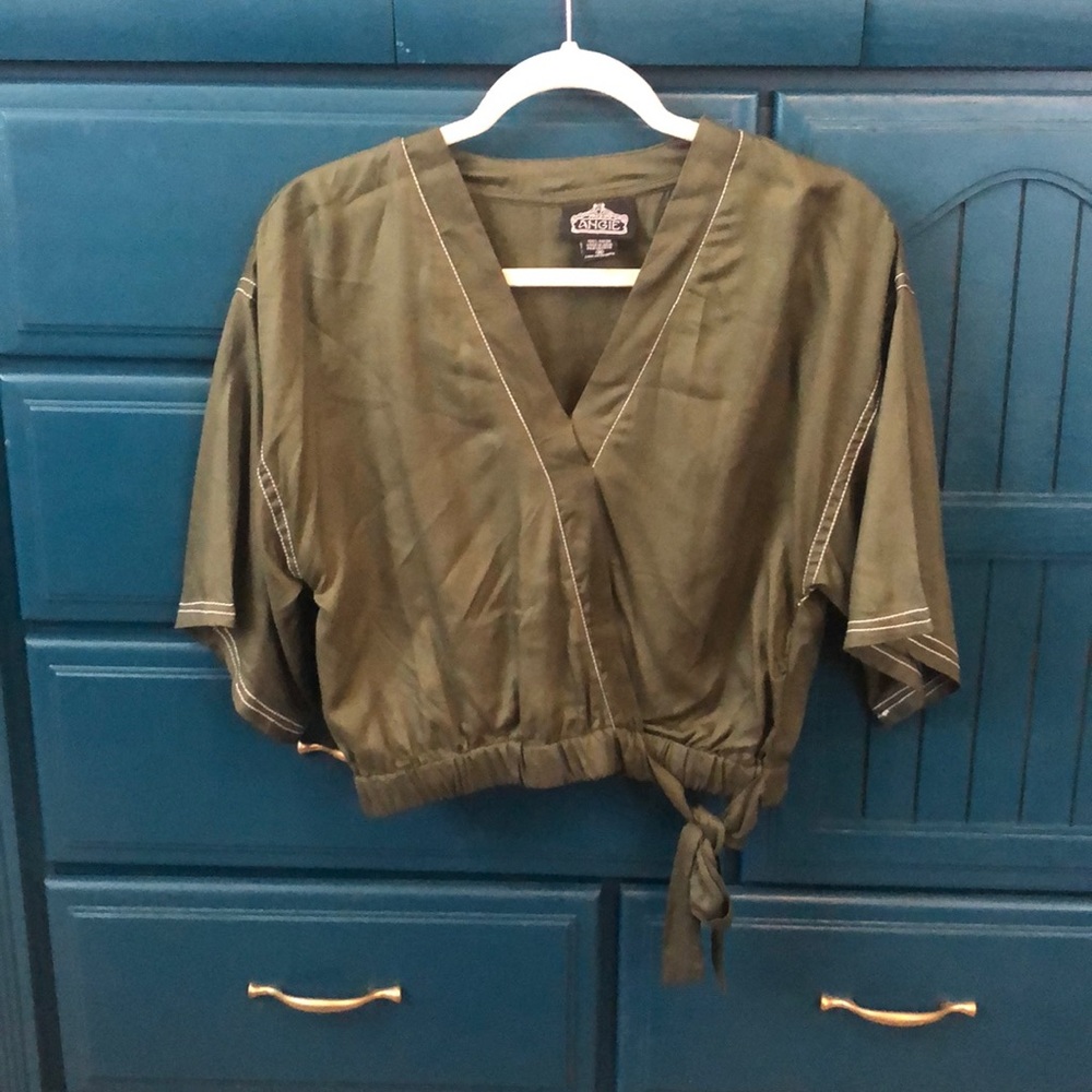 Mock wrap midi rise blouse.